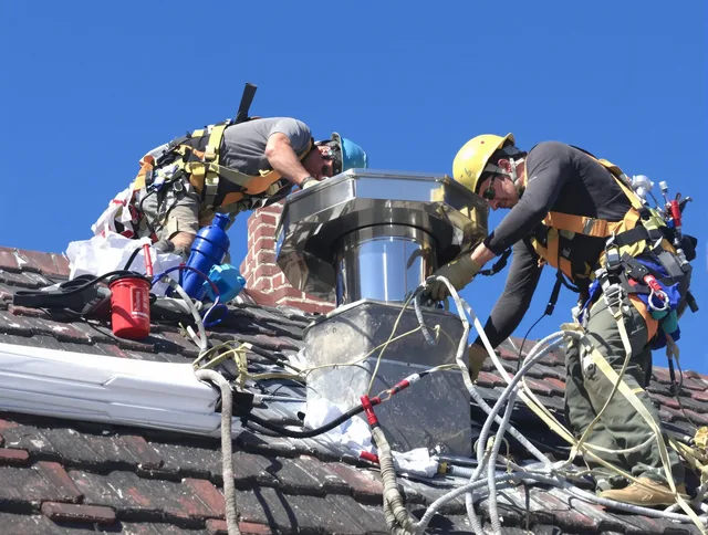 Protective chimney cap installed by Plainville Chimney Sweep in Plainville, CT