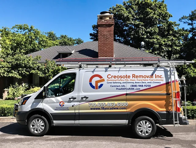 Plainville Chimney Sweep technician removing creosote safely in Plainville, CT